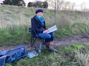 Tracey Ross sketching on the North Norfolk coast for an online art course