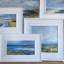 image of a collection of beach paintings by artist Tracey Ross